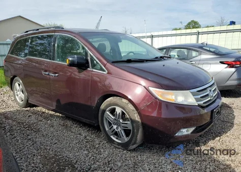 2012 Honda Odyssey Touring z USA, uszkodzony, nr VIN 5FNRL5H95CB020331